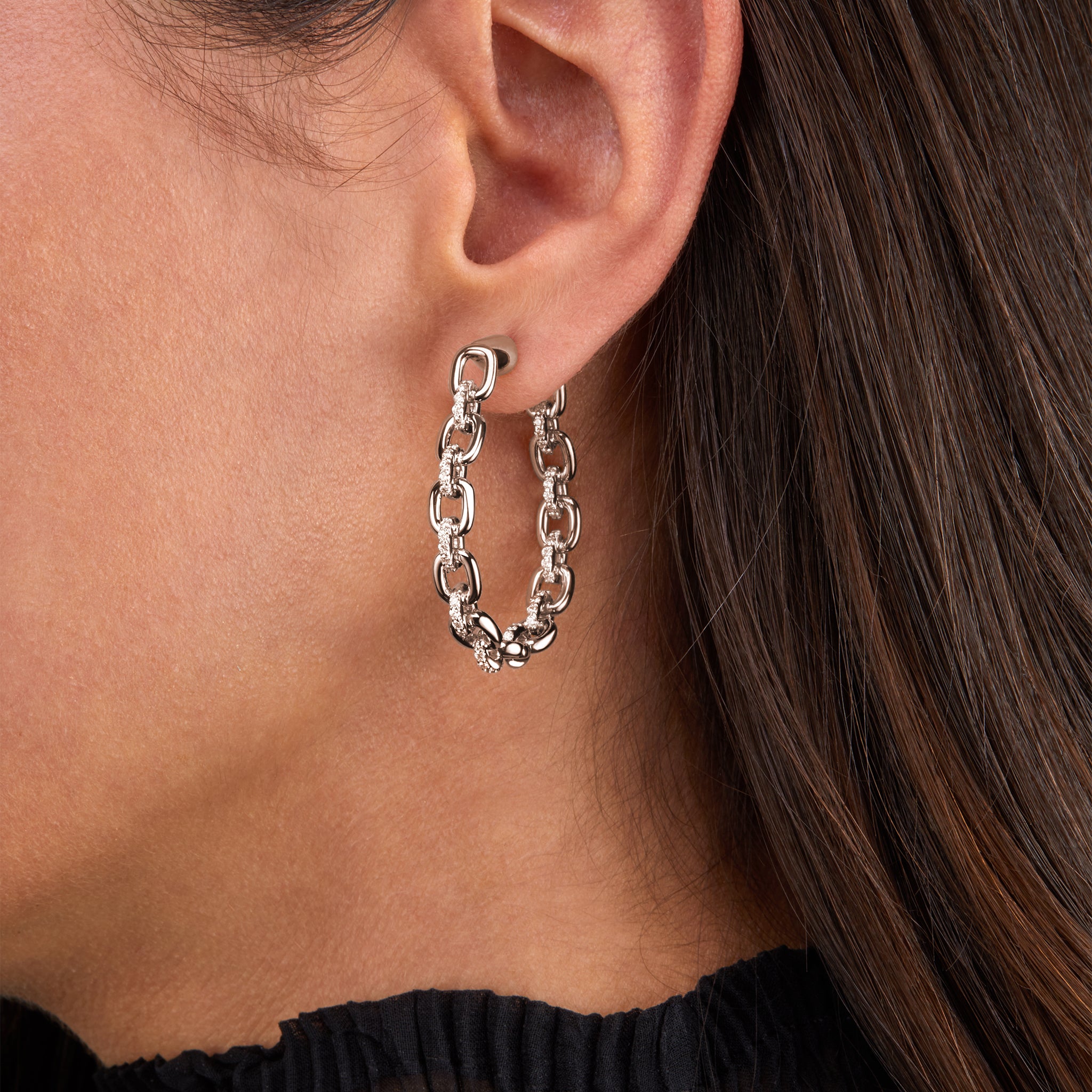 white gold horsebit link chain hoop earrings on model