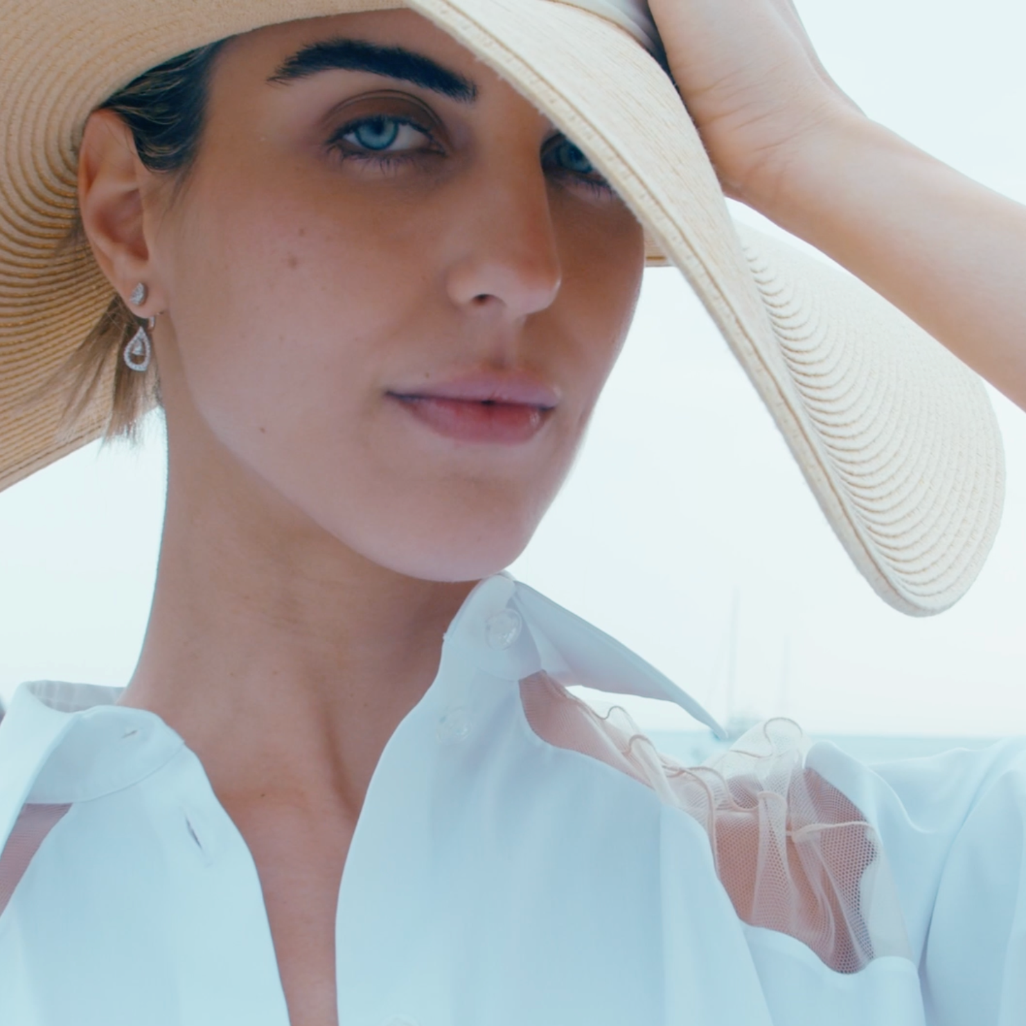 Venus Earrings displayed on model 